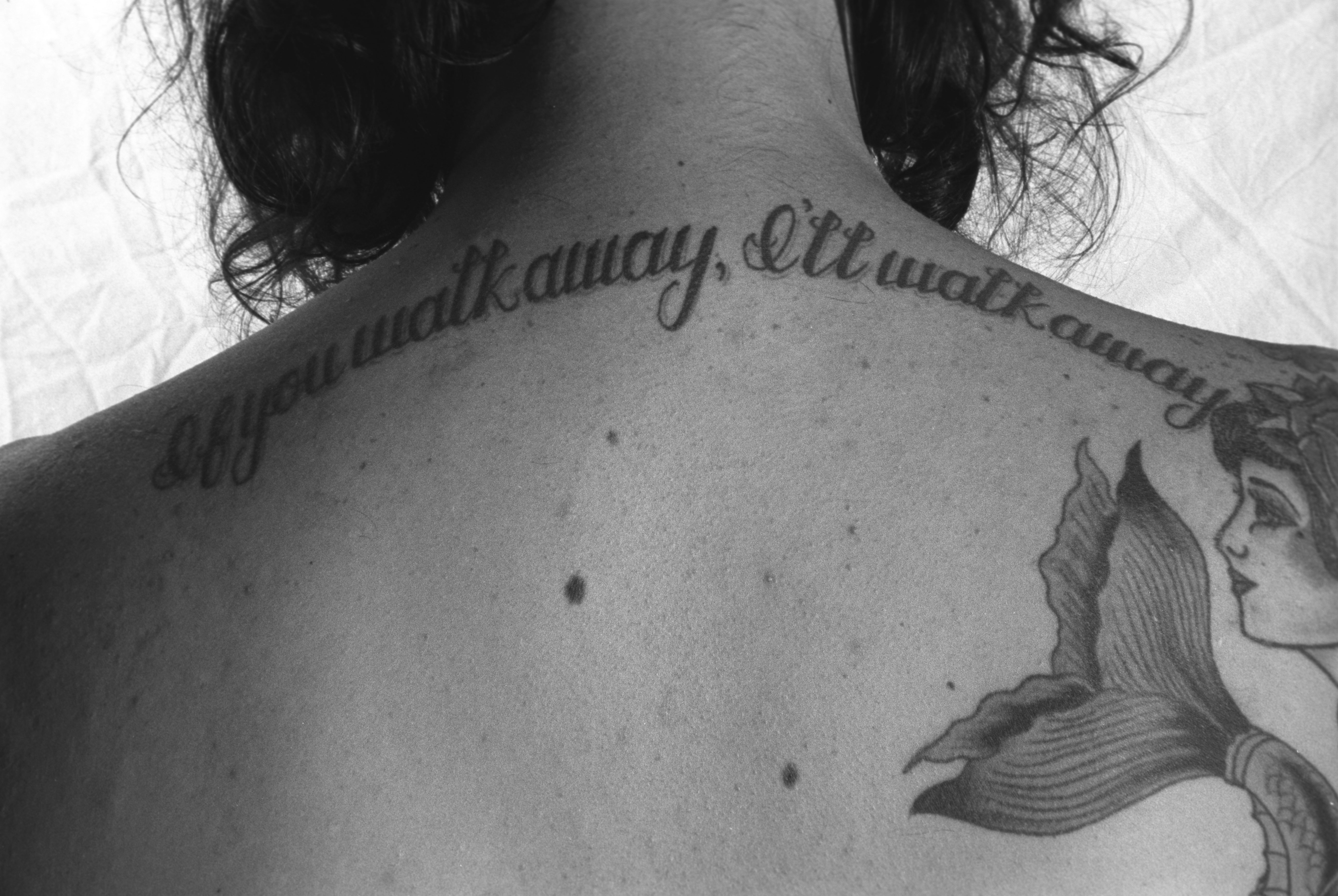 Samantha Herbert Model tattoos on back Stock Photo - Alamy