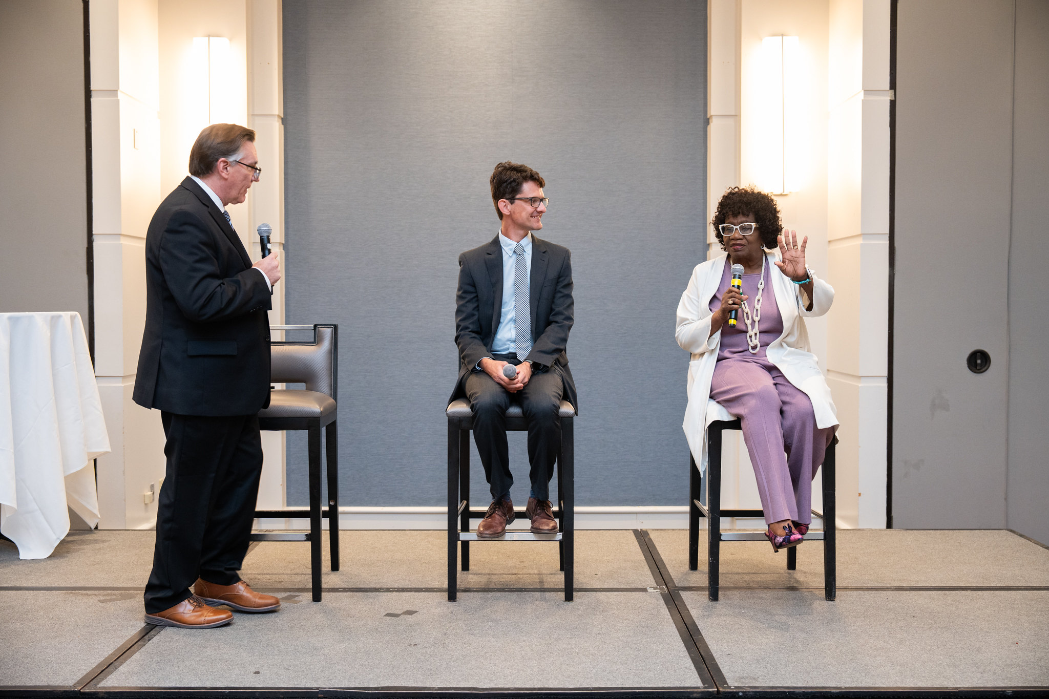 From left, Roby Brock ’88, Ben Goodwin ’01, and Senator Linda Chesterfield ’69 during the panel discussion portion of the 2024 Friends of Children Annual Luncheon at which Chesterfield and Goodwin were honored. (Photo courtesy AACF)